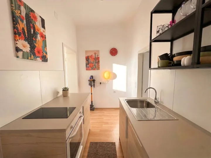 Voll ausgestattete Küche – Familien-Apartment mit Etagenbett